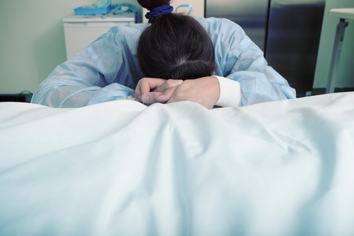 Family mourns for the dead in hospital